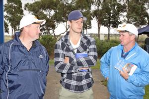 John, Wayne and Carlton great Bryce Gibbs inspecting yearlings at the sales